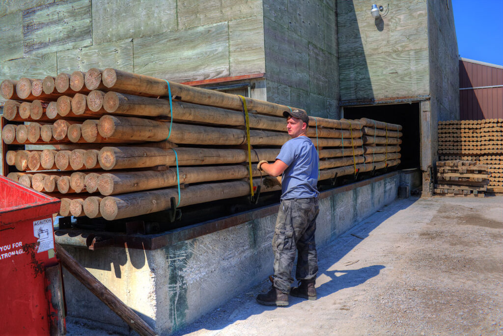 Bundles of posts ready for pressure treating