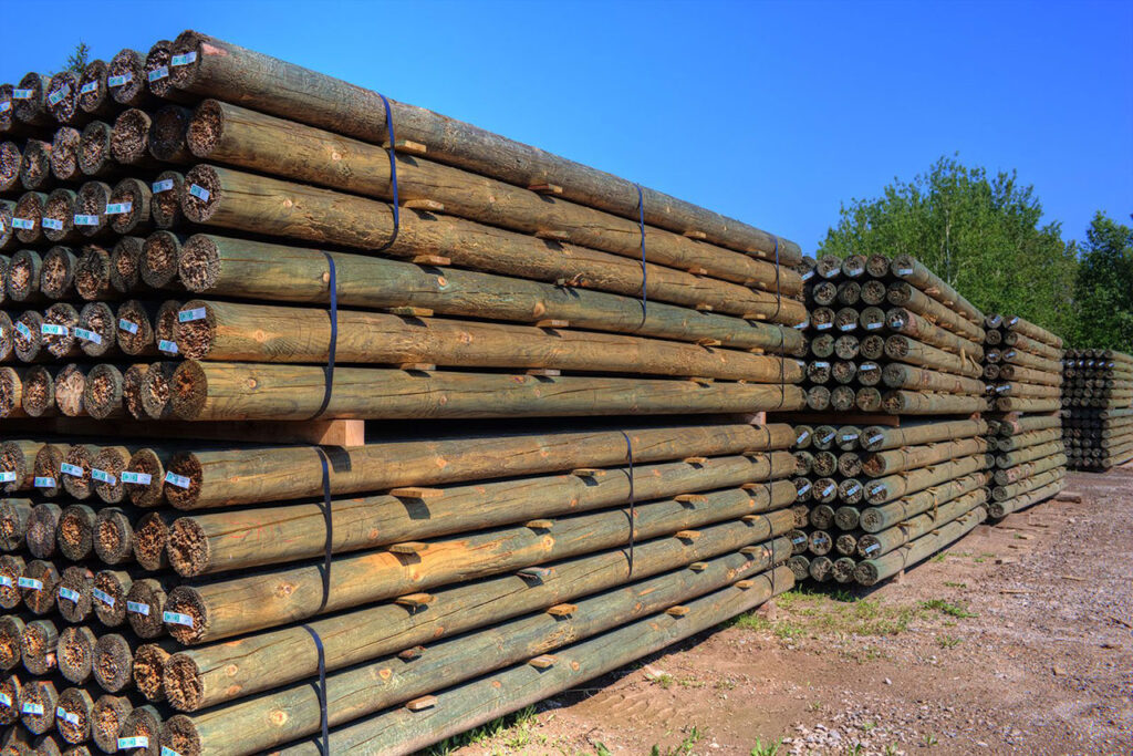 West Branch Wood Treating Bundles of Treated Posts